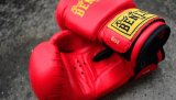 Why are boxing gloves red?